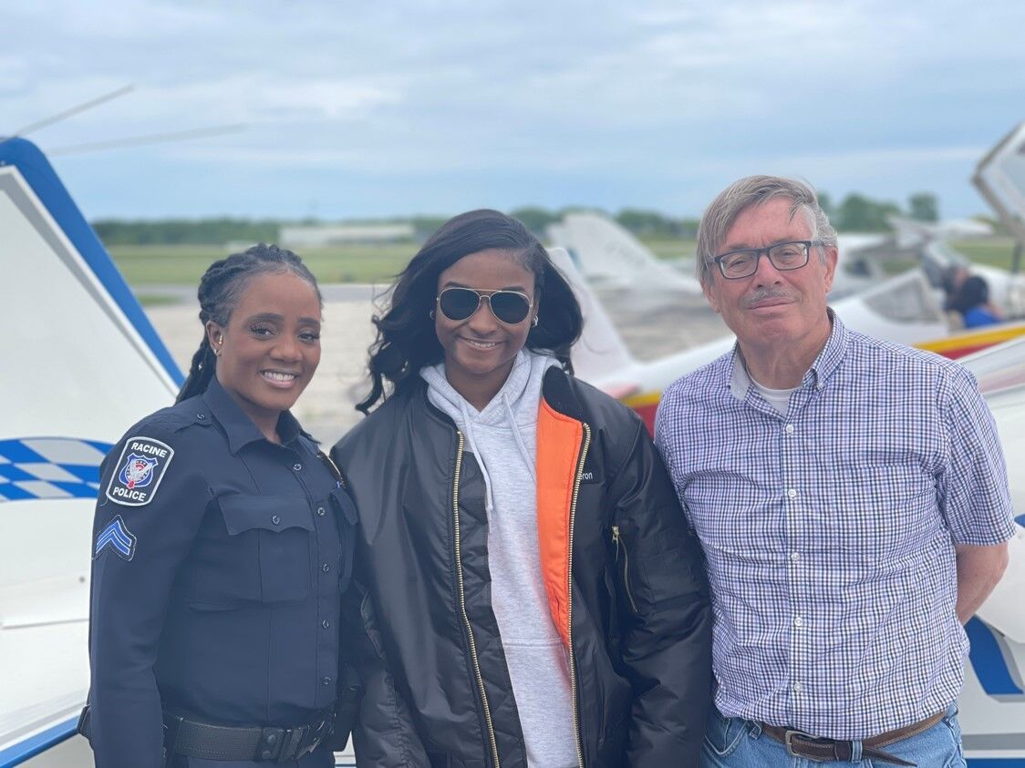 Detective Tonya Scarvers, Soija Cameron, with pilot Ralph Skorupa.